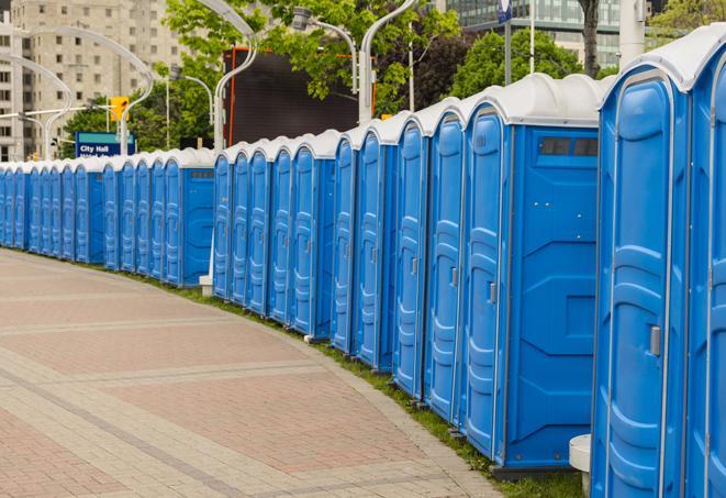 a line of portable restrooms set up for a wedding or special event, ensuring guests have access to comfortable and clean facilities throughout the duration of the celebration in College Point, NY